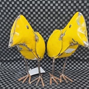 Yellow Metal Bird Sculptures